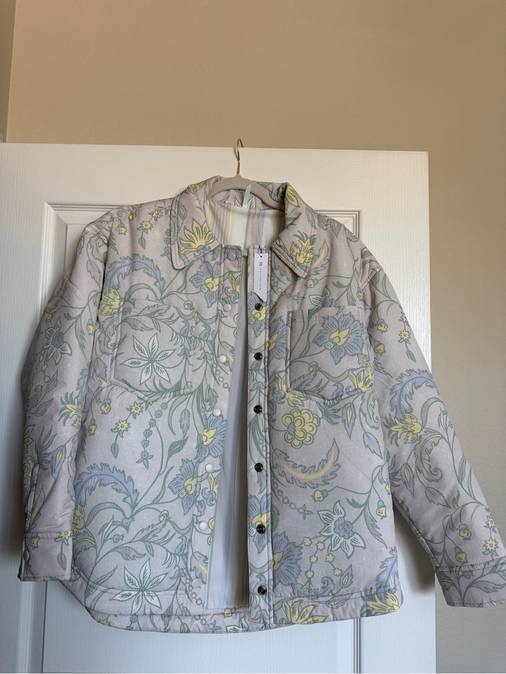 Travis Mathew NWT Floral Print Quilted Jacket